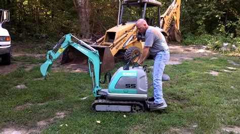 mini micro electric excavator|stand behind mini excavator.